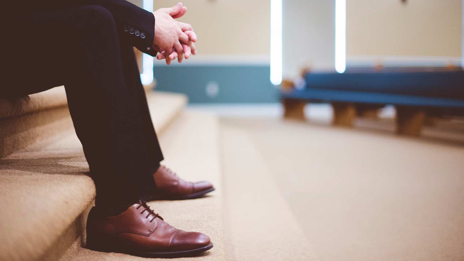 Person Waiting in Church