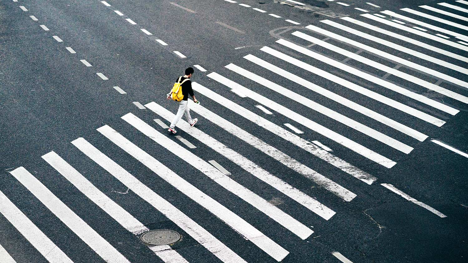 Person walking on crosswalk